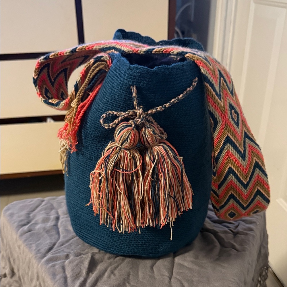 Handwoven Teal Bucket Bag with Multicolor Tassel Strap